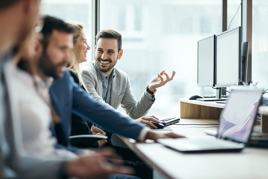 Employees smiling during workplace training