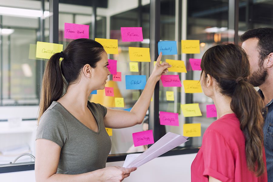 Employees taking part in a business simulation